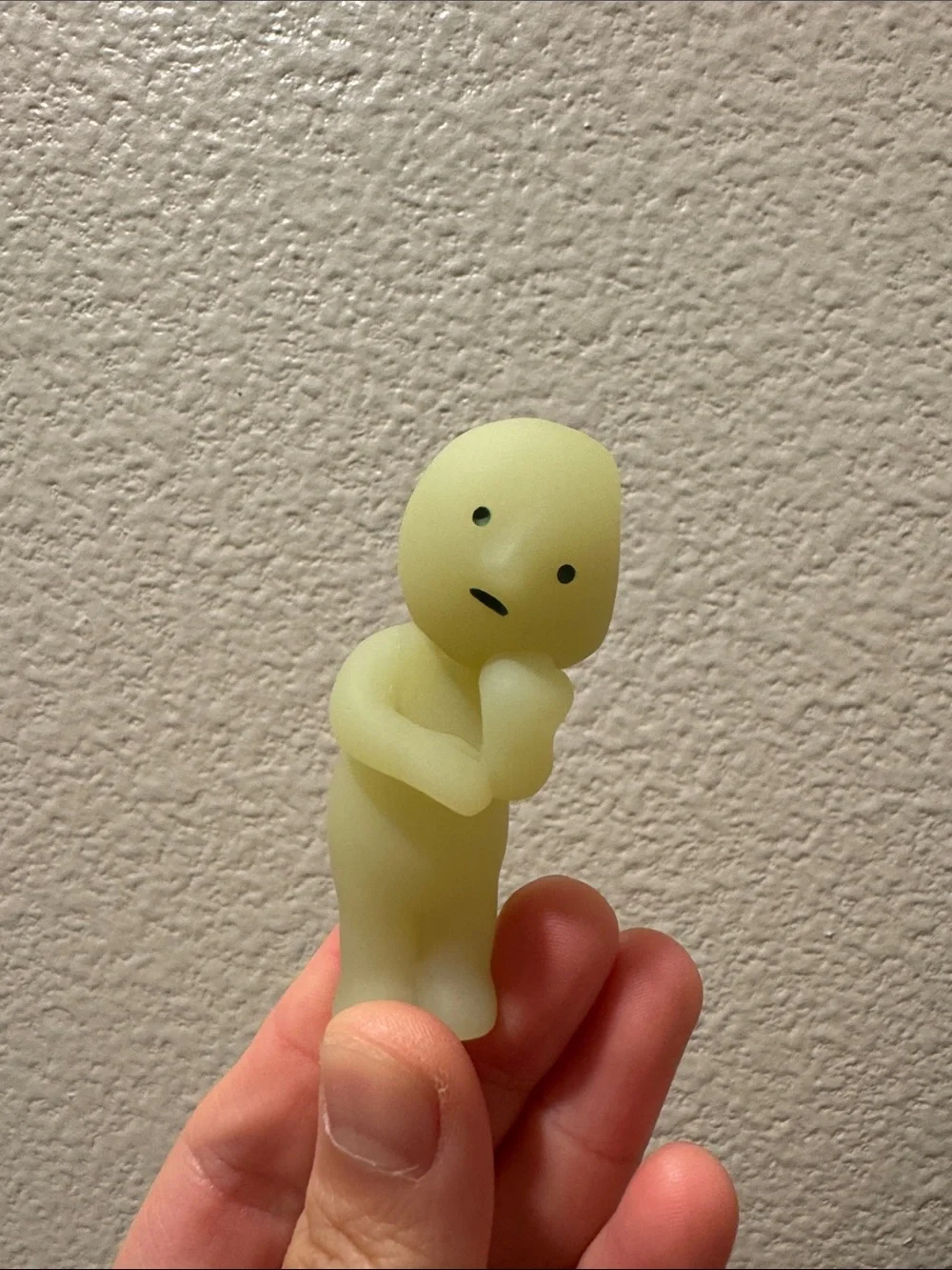 Smiski Leaning Glow-In-The-Dark Collectible